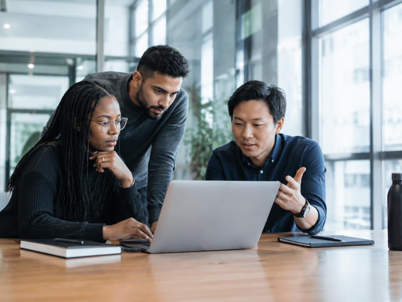 A diverse team of technology professionals collaborating